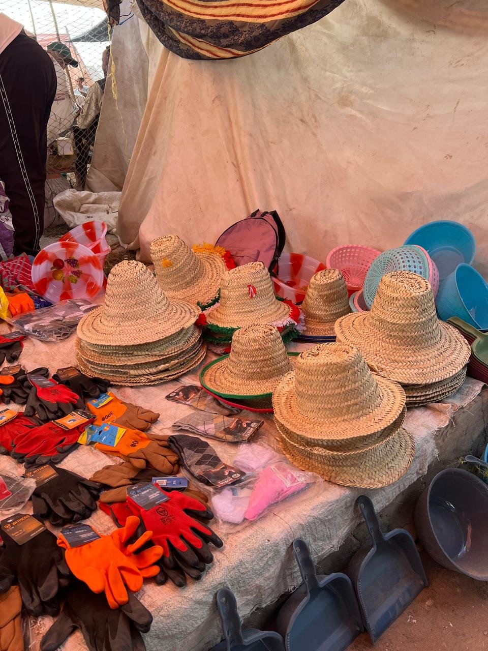 Handmade woven hats at a rural market near Essaouira